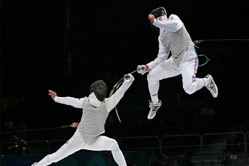 Fencers with one in a leap